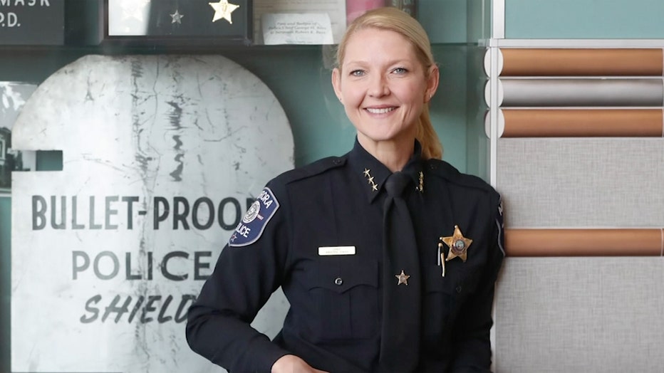 Police chief in uniform smiles