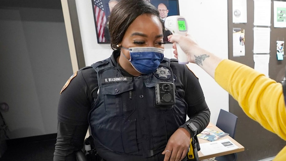 Sheriff's deputy wears a mask, gets temperature checked