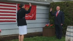 Amid canceled ceremonies, Marine officer commissioned from family's backyard