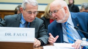 For top U.S. virus experts, faith and science work together