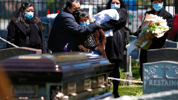 Young Brooklyn priest loses mentor, then his father -- both to virus