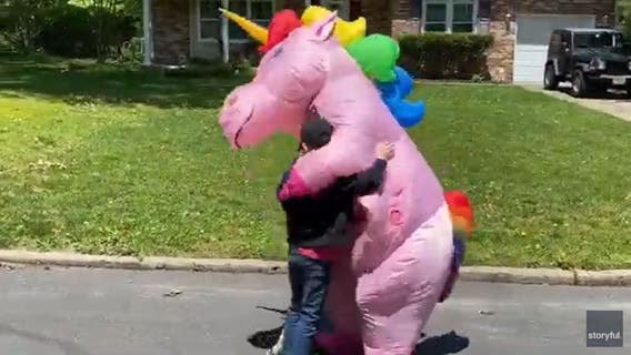 Grandma wears colorful unicorn costume to greet her grandkids amid pandemic