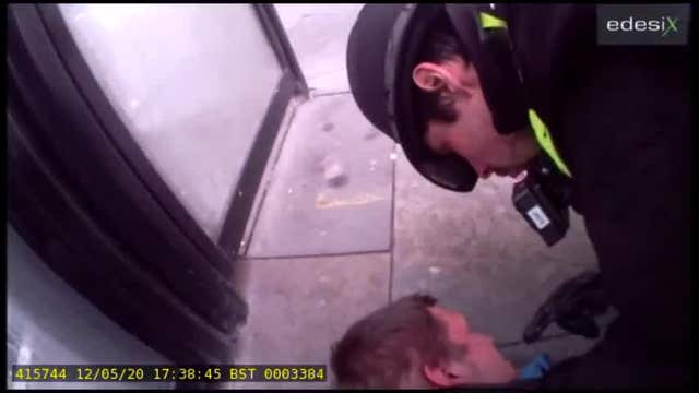 Drunk man claiming to have COVID coughs in cop's face