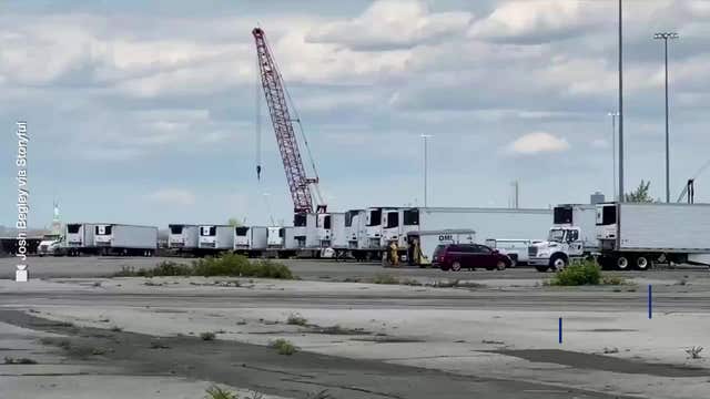 Trucks for bodies line Brooklyn pier as funeral homes remain overwhelmed