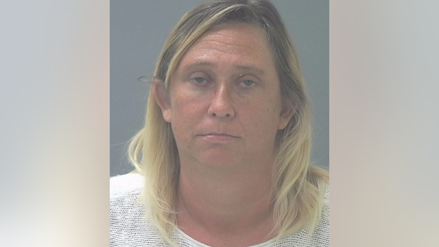 Woman accused of brutally abusing adopted son