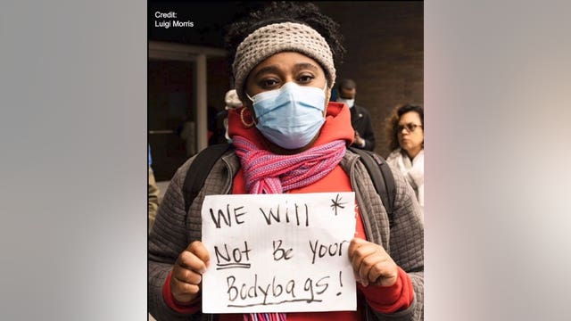 Nurse in viral photo:  'Don't call me a hero'