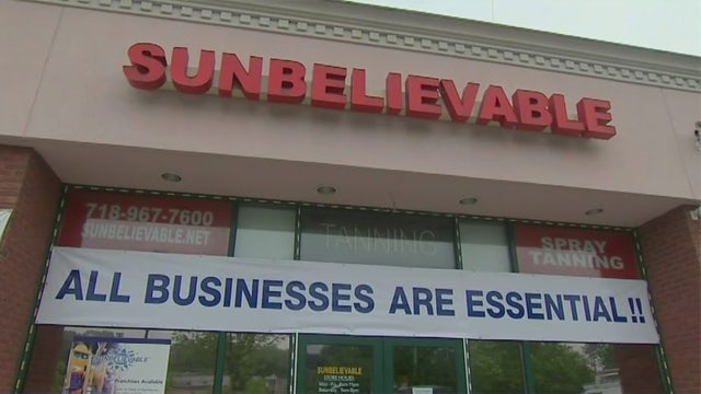 Tanning salon owner tries to reopen; gets shut down again