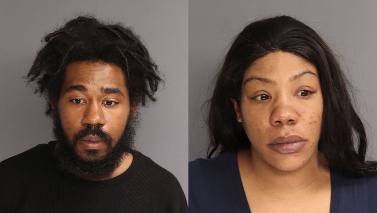 Booking photos for two suspects