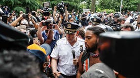 NYPD Chief of Department hugs, kneels with protesters