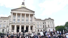 Protesters call attention to deaths of two more black men