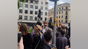 Protesters in England tear down statue of slave trader Edward Colston