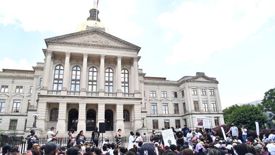 Protesters call attention to deaths of two more black men
