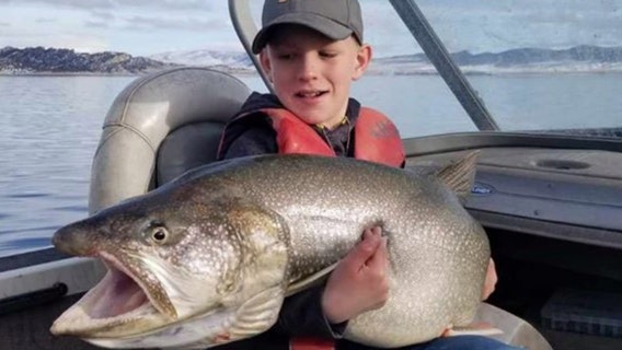 10-year-old reels in massive fish