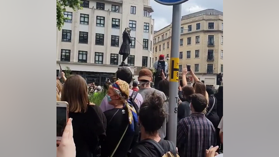 Protesters in England tear down statue of slave trader Edward Colston