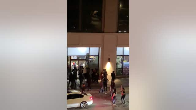 Throngs of looters rip through store in Chelsea