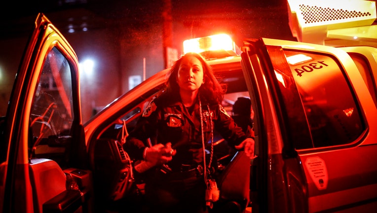 Paramedic in her ambulance