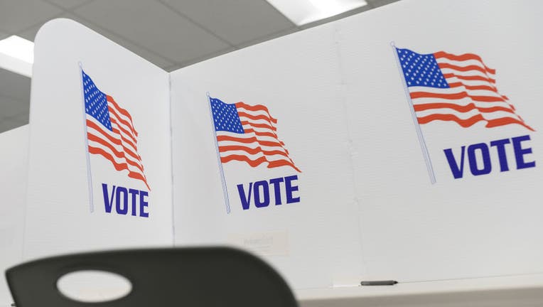 FILE - Privacy blinds set up on a table at the Minneapolis Early Vote Center on January 17, 2020 in Minneapolis, Minnesota.