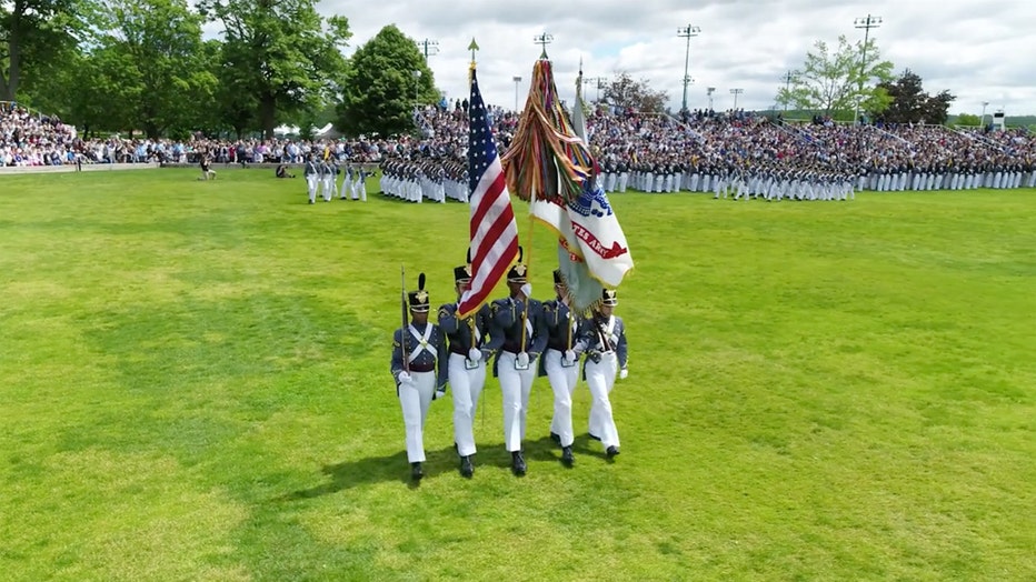Cadets carrying flags