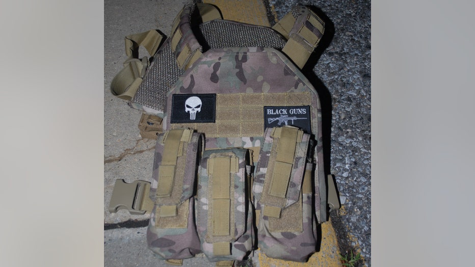 A camouflage-patterned tactical vest