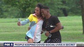 Some people keeping COVID-19 social lives a secret, according to new survey