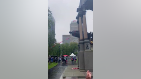 Statue of Canada's first Prime Minister toppled by protesters in Montreal