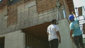 Teenagers volunteer to help rebuild home for Superstorm Sandy victim