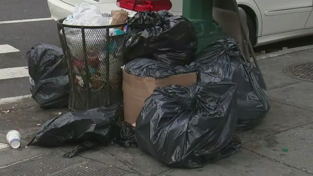 Trash piles up amid New York's pandemic budget crunch