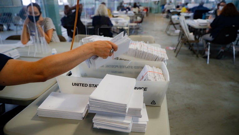 Postal working sorting mail