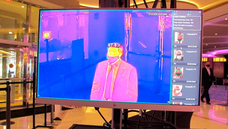 Thermal image of a man on a screen