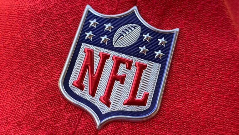 The official NFL logo is seen on the back of a hat 
