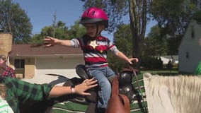 Michigan toddler with leukemia defies odds and is in remission; gets chance to be a real cowboy