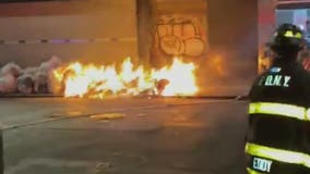 Suspect charged with setting fire to trash piles in Manhattan