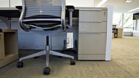 Desk shortage forces people to get creative about workspaces