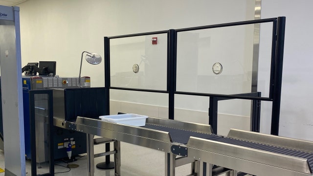 Virus barriers going up at LaGuardia Airport security checkpoints