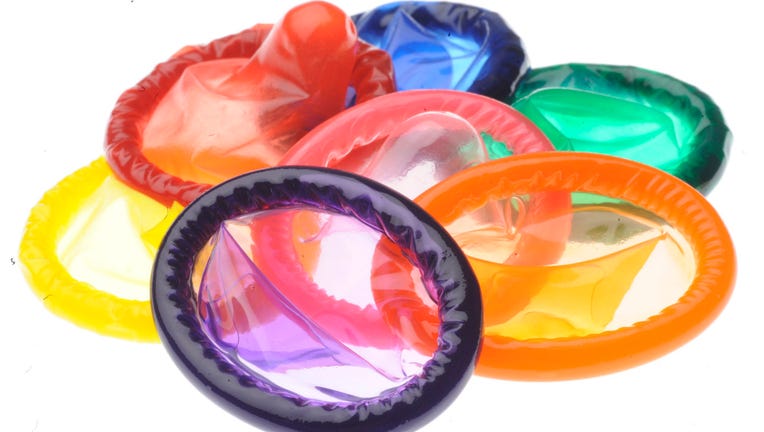 Assorted colors of condoms.