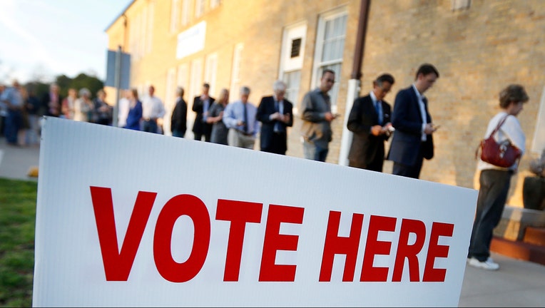 Voters line up to cast their ballots. (File)