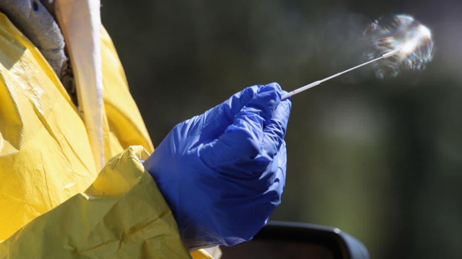 A close-up view of a swab used by medical workers to administer the coronavirus test at the drive-in center at ProHealth Care on March 21, 2020 in Jericho, New York.