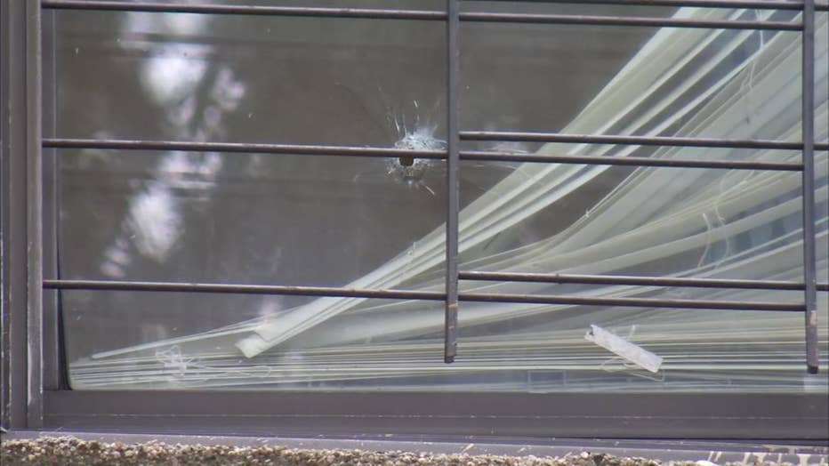 A woman was killed by a random bullet that went through the window of her 7th floor apartment.