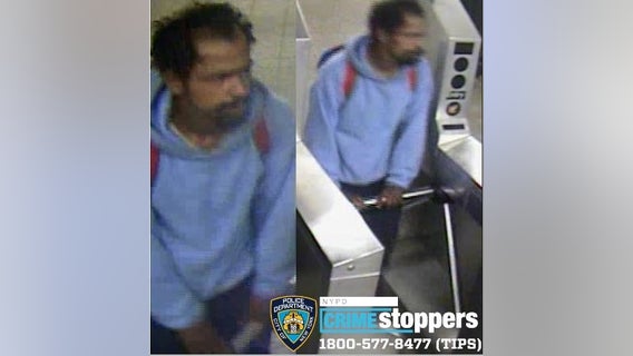 Woman pushed onto subway tracks in Times Square; suspect in custody