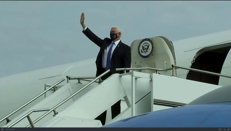 Vice President Mike Pence arrives for campaign event in Janesville, Wis.