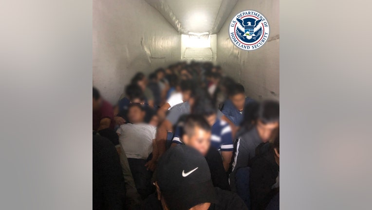 Dozens of people crammed into tractor-trailer cargo hold