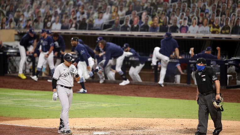 Gio Urshela #29 of the New York Yankees reacts after lining out during the ninth inning