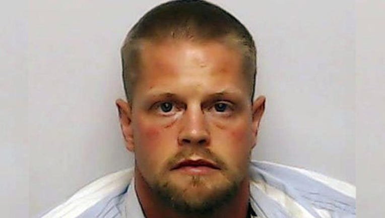 In this undated booking file photo provided by the Clark County, Ind., Sheriff's Office shows Joseph Oberhansley.