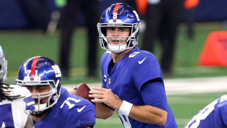 Daniel Jones #8 of the New York Giants looks to pass against the Dallas Cowboys during the second quarter at AT&T Stadium on October 11, 2020 in Arlington, Texas. (Photo by Tom Pennington/Getty Images)