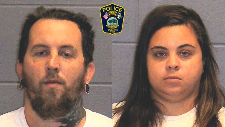Booking photos of a man and woman