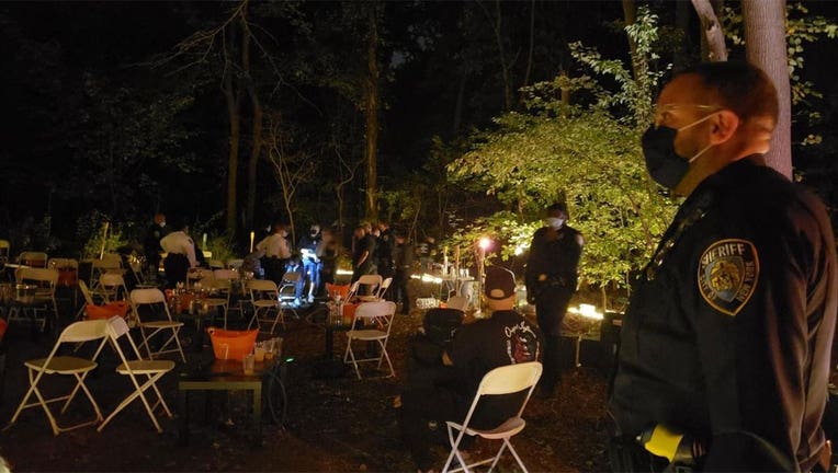 Deputy Sheriffs shut down a rave inside Cunningham Park, Queens. (Credit: @NYCSHERIFF)