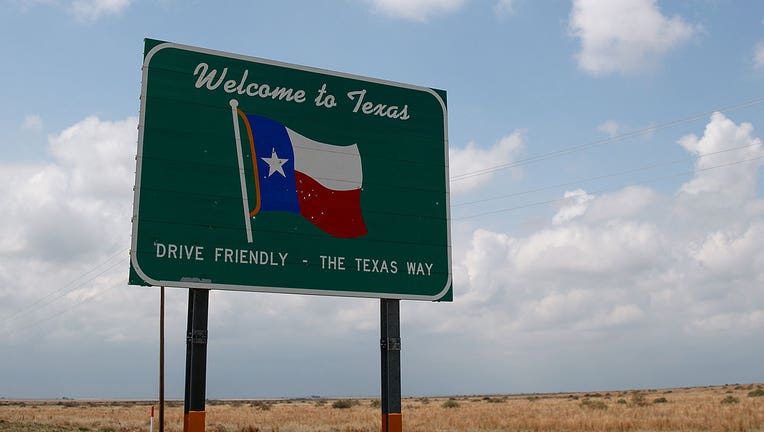 A 'Welcome to Texas' sign stands on the side of the road near Dalhart, Texas.(File Photo by Drew Angerer/Getty Images)