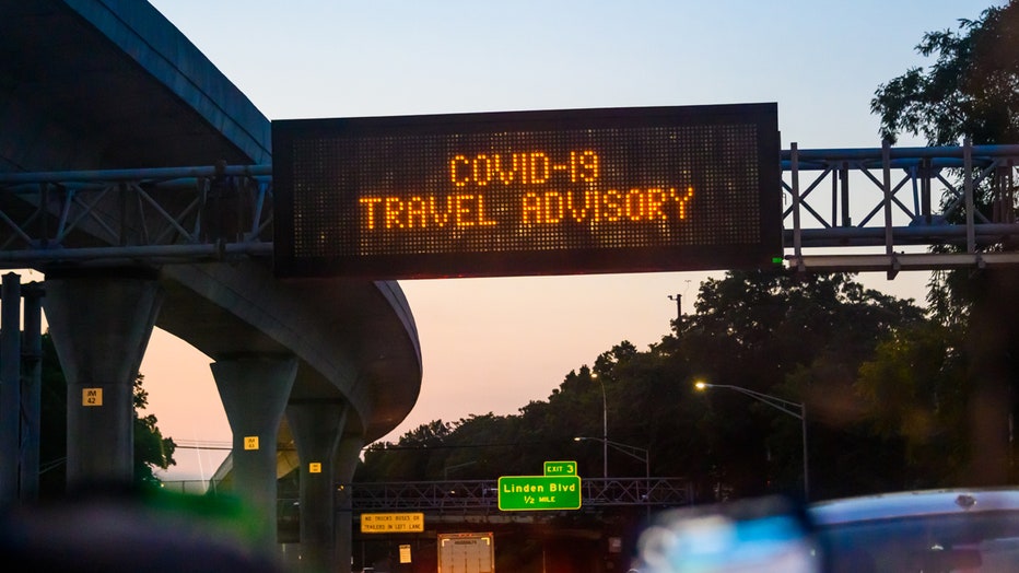 A digital billboard reads