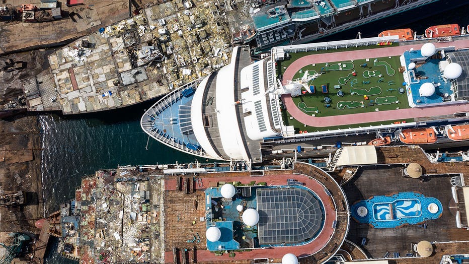 In this aerial view from a drone, luxury cruise ships are seen being broken down for scrap metal at the Aliaga ship recycling port on October 02, 2020 in Izmir, Turkey.(Photo by Chris McGrath/Getty Images)