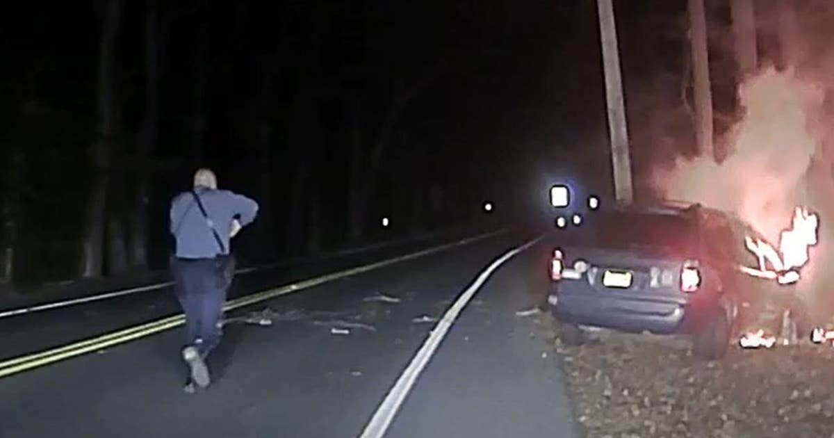 NJ police officer rescues man trapped in burning car | FOX 5 New York
